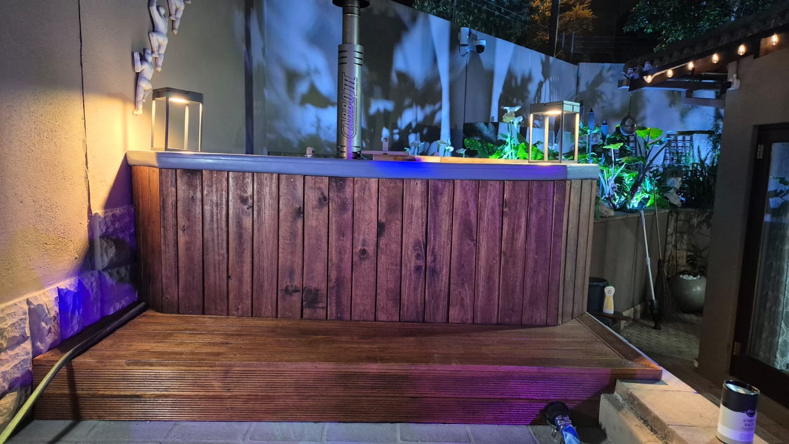 Carbo III woodfired hot tub on a patio